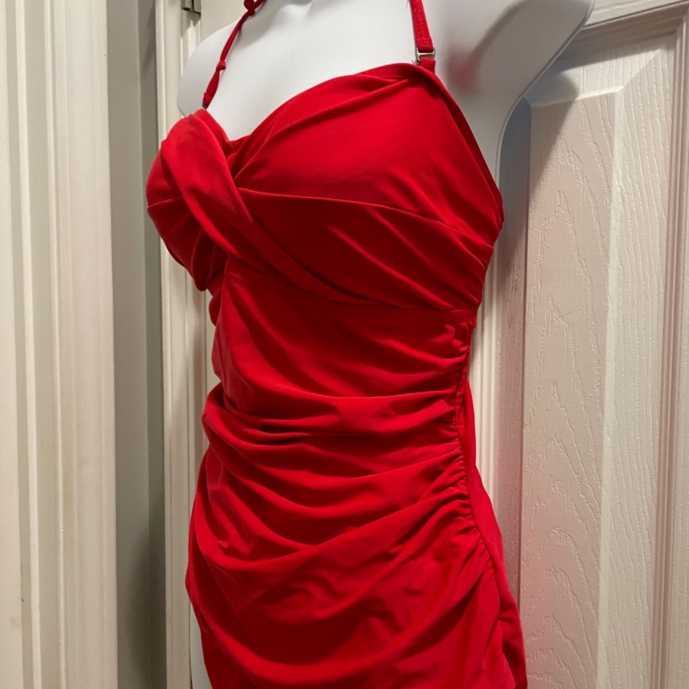 Gorgeous ruched/flowing bathing suit w/subtle lower flow.  Sz 12. Barely worn!